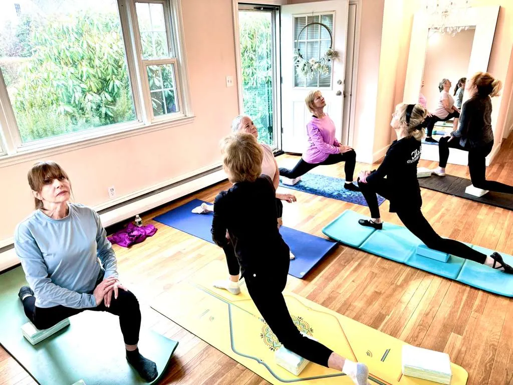 Conditioning and Floor Barre session on mats at the VW Dance studio